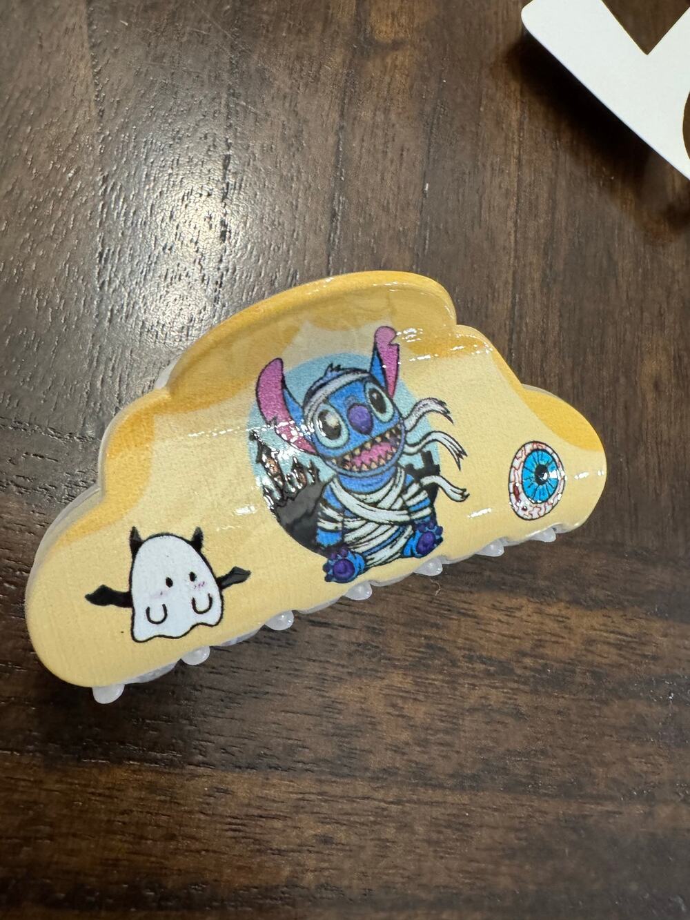 Lilo & Stitch Halloween hair clip with blue Stitch character, ghost, and eyeball